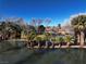 Calm pond, surrounded by palm trees and lush greenery at 4255 W State Highway 168, Moapa, NV 89025