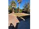 Landscaped backyard with grass, trees and gravel at 4345 Al Carrison St, Las Vegas, NV 89129