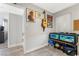 Cozy bedroom with guitar decor and a fish tank at 4818 El Tesoro Ave, Las Vegas, NV 89121