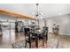 Dining area with a dark wood table and rug at 4818 El Tesoro Ave, Las Vegas, NV 89121