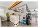 Modern home bar with wood countertop and shelving at 4818 El Tesoro Ave, Las Vegas, NV 89121