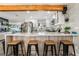 Modern kitchen with white cabinets and island at 4818 El Tesoro Ave, Las Vegas, NV 89121