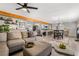Open concept living area with kitchen view at 4818 El Tesoro Ave, Las Vegas, NV 89121
