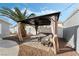 Covered patio with seating area, perfect for outdoor entertaining at 4818 El Tesoro Ave, Las Vegas, NV 89121