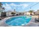 Sparkling kidney-shaped pool, perfect for relaxation at 4818 El Tesoro Ave, Las Vegas, NV 89121