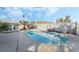Relaxing kidney-shaped pool with patio furniture and gazebo at 4818 El Tesoro Ave, Las Vegas, NV 89121