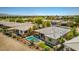 Aerial view of homes with pools and mountain views in the background at 4884 E Cactus Canyon Dr, Pahrump, NV 89061