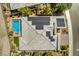Home with solar panels and a pool, top-down view at 4884 E Cactus Canyon Dr, Pahrump, NV 89061