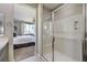 Bathroom with a large walk-in shower and view to bedroom at 4884 E Cactus Canyon Dr, Pahrump, NV 89061