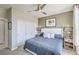 Bedroom with king-size bed and double doors to closet at 4884 E Cactus Canyon Dr, Pahrump, NV 89061