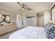 Bright bedroom with large bed and access to the bathroom at 4884 E Cactus Canyon Dr, Pahrump, NV 89061