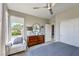 Bright bedroom with large window, dresser, and comfortable seating at 4884 E Cactus Canyon Dr, Pahrump, NV 89061