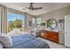 Spacious bedroom with large window and dresser, offering ample natural light at 4884 E Cactus Canyon Dr, Pahrump, NV 89061