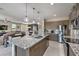 Updated kitchen featuring stainless steel appliances and granite countertops at 4884 E Cactus Canyon Dr, Pahrump, NV 89061