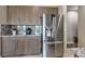 Modern kitchen with stainless steel appliances and granite countertops at 4884 E Cactus Canyon Dr, Pahrump, NV 89061