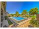 Luxury backyard pool with stonework and mountain views at 4884 E Cactus Canyon Dr, Pahrump, NV 89061