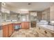 Large bathroom with granite countertops, a soaking tub, and a walk-in shower at 6336 Fence Post St, Las Vegas, NV 89148