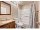 Bathroom with tub, toilet and vanity at 6336 Fence Post St, Las Vegas, NV 89148