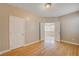 Spacious bedroom with hardwood floors and access to another room at 6336 Fence Post St, Las Vegas, NV 89148