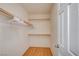 Large closet with wood floors and ample shelving at 6336 Fence Post St, Las Vegas, NV 89148