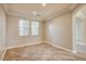 Bright dining room with tile floors and crown molding at 6336 Fence Post St, Las Vegas, NV 89148