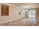 Bright dining room featuring tile floors and large windows at 6336 Fence Post St, Las Vegas, NV 89148