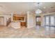 Open concept dining area with kitchen and entryway views at 6336 Fence Post St, Las Vegas, NV 89148