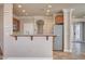 Kitchen features granite countertops and wood cabinets at 6336 Fence Post St, Las Vegas, NV 89148