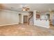 Living room with tile floors, high ceilings and staircase at 6336 Fence Post St, Las Vegas, NV 89148