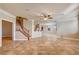Open living room with hardwood floors and kitchen access at 6336 Fence Post St, Las Vegas, NV 89148