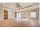 Main bedroom with hardwood floors, high ceilings, and walk-in closet at 6336 Fence Post St, Las Vegas, NV 89148