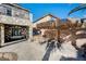 Outdoor kitchen and dining area under palapa at 6336 Fence Post St, Las Vegas, NV 89148