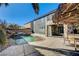 Resort-style backyard oasis with pool and patio at 6336 Fence Post St, Las Vegas, NV 89148