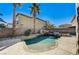 Freeform pool and spa with flagstone decking at 6336 Fence Post St, Las Vegas, NV 89148