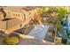 Home's backyard, showcasing the pool and court at 7258 Sashaying Spirit Ct, Las Vegas, NV 89131