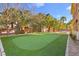 Landscaped backyard with putting green at 7258 Sashaying Spirit Ct, Las Vegas, NV 89131