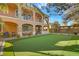Putting green, patio, and home's exterior at 7258 Sashaying Spirit Ct, Las Vegas, NV 89131
