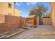 Landscaped backyard with garden and storage shed at 7258 Sashaying Spirit Ct, Las Vegas, NV 89131