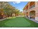 Putting green and view of home's exterior at 7258 Sashaying Spirit Ct, Las Vegas, NV 89131