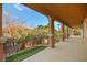 Covered balcony overlooking the backyard putting green at 7258 Sashaying Spirit Ct, Las Vegas, NV 89131