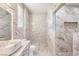 Elegant bathroom with marble tile and modern fixtures at 7258 Sashaying Spirit Ct, Las Vegas, NV 89131
