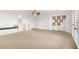 Bright bedroom featuring built-in shelving and carpet at 7258 Sashaying Spirit Ct, Las Vegas, NV 89131