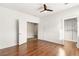 Light bedroom with wood floors and ample closet space at 7258 Sashaying Spirit Ct, Las Vegas, NV 89131