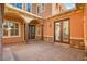 Courtyard entry with brick flooring and double doors at 7258 Sashaying Spirit Ct, Las Vegas, NV 89131