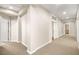 Hallway with carpet and access to multiple rooms at 7258 Sashaying Spirit Ct, Las Vegas, NV 89131