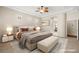 Spacious main bedroom with virtual staging and en-suite bathroom at 7258 Sashaying Spirit Ct, Las Vegas, NV 89131