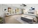 Virtually staged main bedroom with sliding barn door to closet at 7258 Sashaying Spirit Ct, Las Vegas, NV 89131