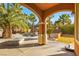 Relaxing patio with pool and fire pit views at 7258 Sashaying Spirit Ct, Las Vegas, NV 89131