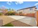 Spacious concrete basketball court in backyard at 7258 Sashaying Spirit Ct, Las Vegas, NV 89131