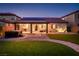 Spacious backyard with covered patio, hot tub, and pergola at 7620 Chase Hallow St, Las Vegas, NV 89149